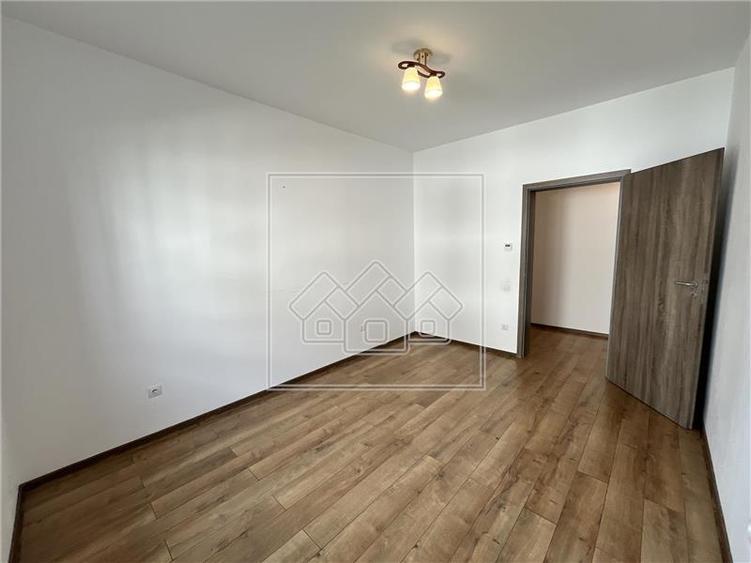 Apartament cu 3 camere, 56,6 mp utili, balcon de 7 mp - Calea Cisnadiei