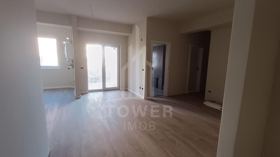 Apartament cu trei camere si gradina proprie