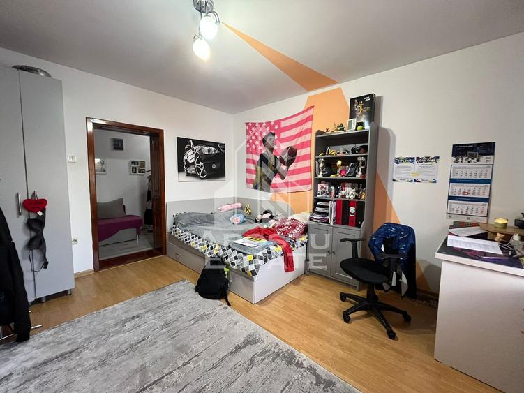 Casa individuala,3 camere, 2 bai, acces auto, garaj,teren 3182 mp