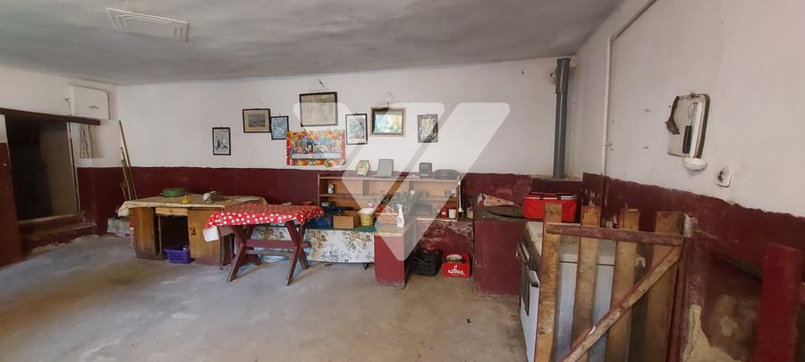 Casa individuala din 2 corpuri 6 camere 2 bai teren 2109 mp Rusi Sibiu