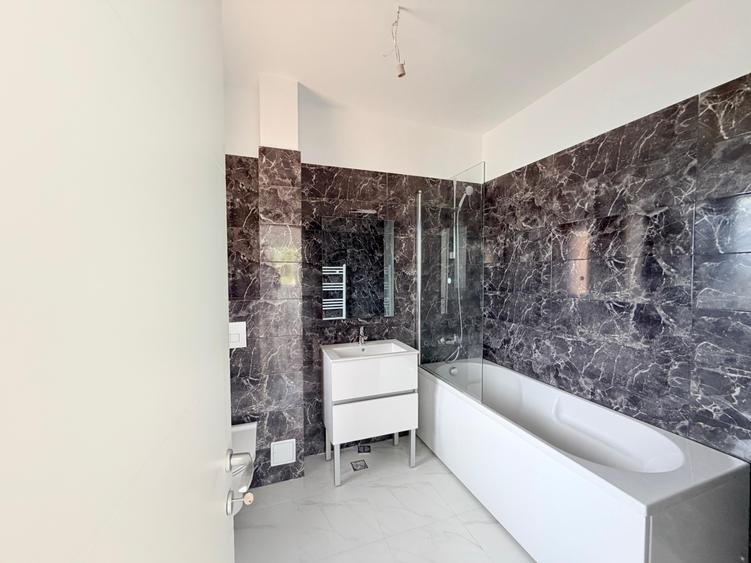 INTABULAT: Apartament cu 3 camere și 2 băi, decomandat, complet echipat