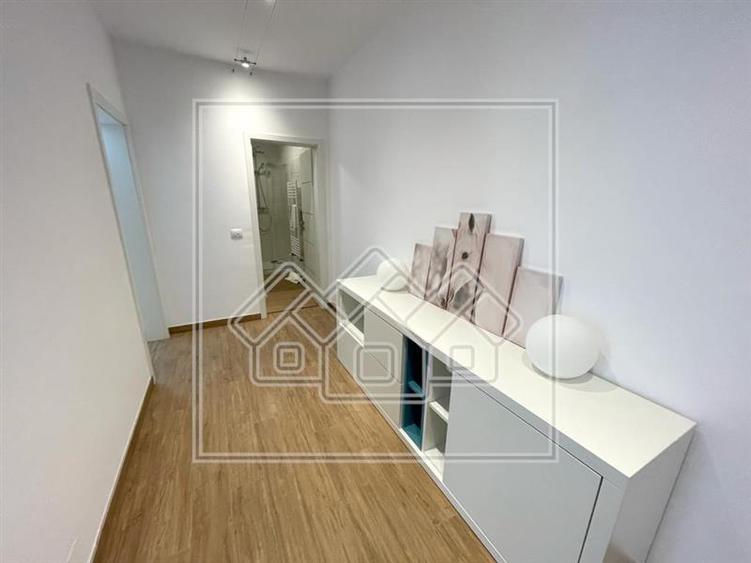 Apartament decomandat, cu 2 camere - 77 mp utili - Mobilier de Lux