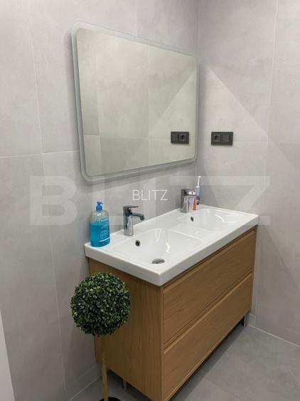 Apartament modern 100mp + parcare subterana - 13