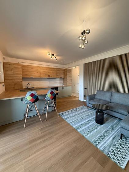 Apartament 2 camere, bloc nou 2024, curte privată și mansardă depozitare-mobilat
