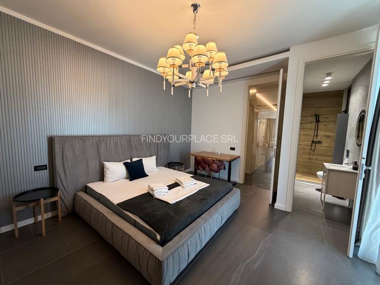 Penthouse în bloc nou boutique,500mp terase,2 parcări incluse