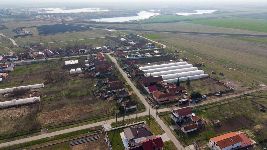 Teren 1.570 mp + casă din cărămidă–zonă liniștită