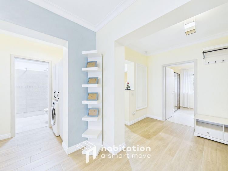 Apartament spațios cu curte și garaj – confortul unei case moderne