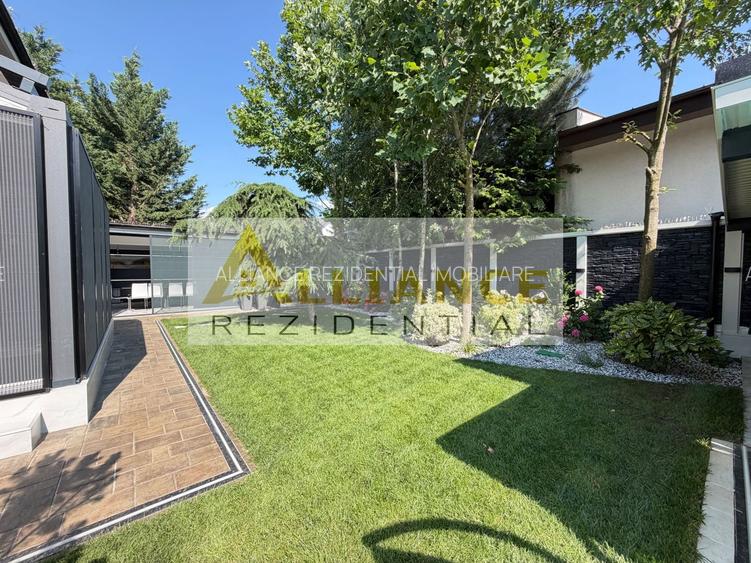 Casa P+1+M cu teren de 650 mp, piscina si curte complet amenajata