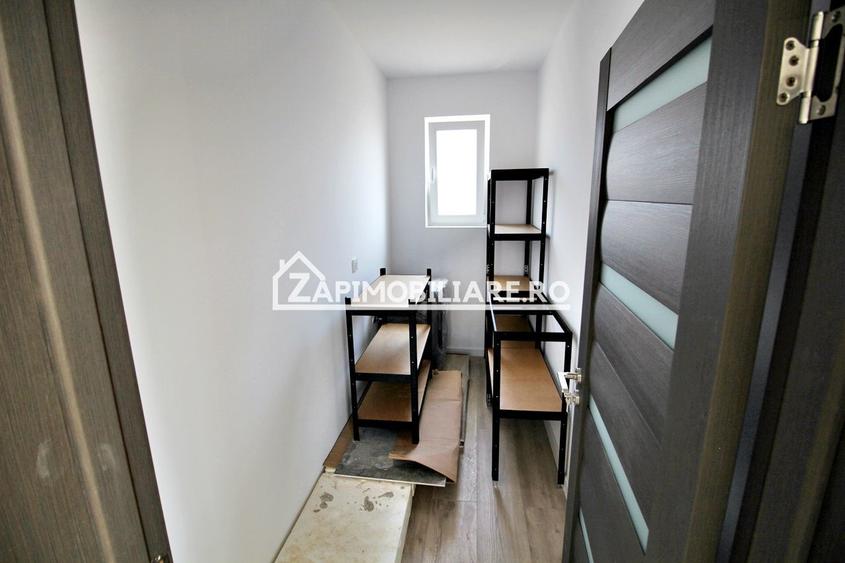 Casa pe 1 nivel,4 camere,2 bai,110 mp.1 dressing,500mp teren