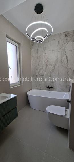 Duplex cu 4 camere si teren generos 350mp - 16