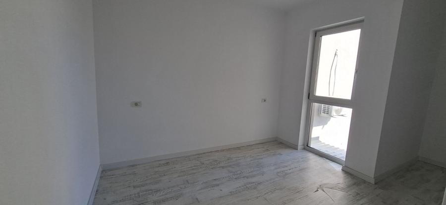 Apartament cu 3 camere si un loc de parcare