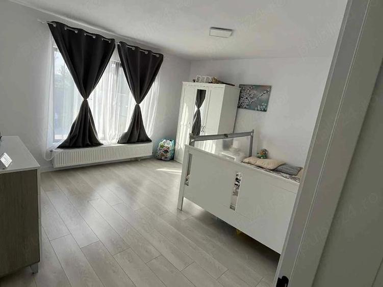 Casa moderna, Isalnita,90MP util + 30MP doua terase,curte spatioasa, panouri