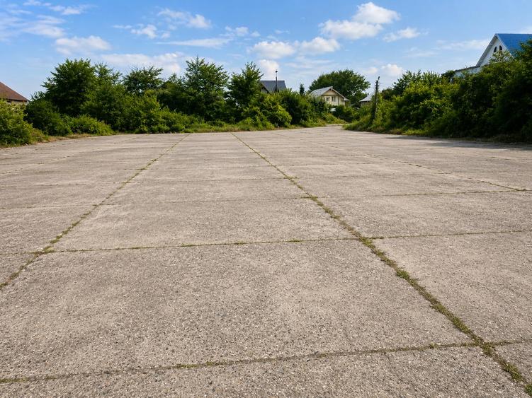 11.180 mp intravilan Drăgășani | Platformă betonată | POT până la 60% | Toate ut