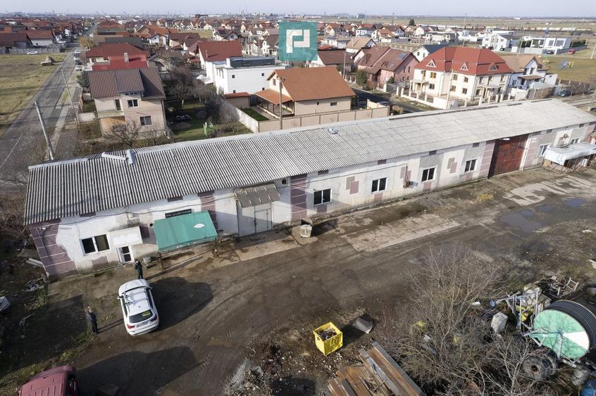 Teren intravilan 6.555 mp cu hală industrială