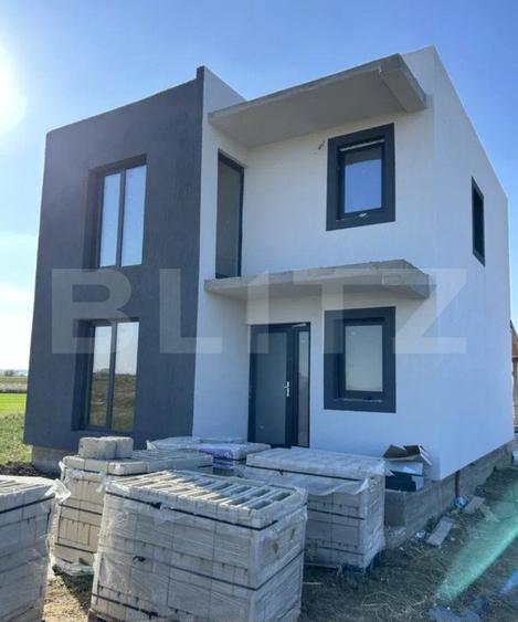 Casa moderna P +E, teren 335 mp, toate utilitatile, zona Isalnita