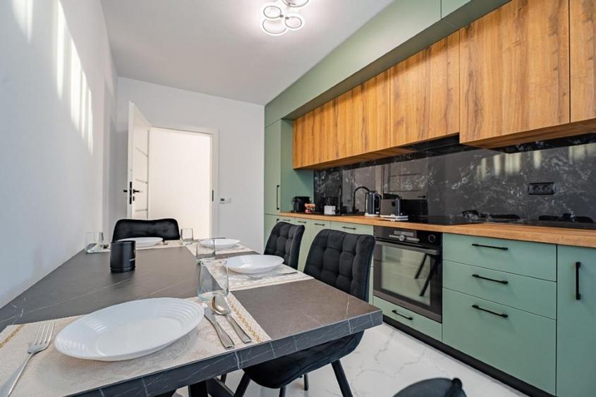 Apartament 2 camere Selimbar, complet mobilat, parcare + incarcare EV