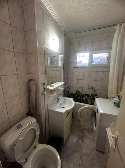 Apartament 2 camere, etajul 1/4, zona Podu Ros