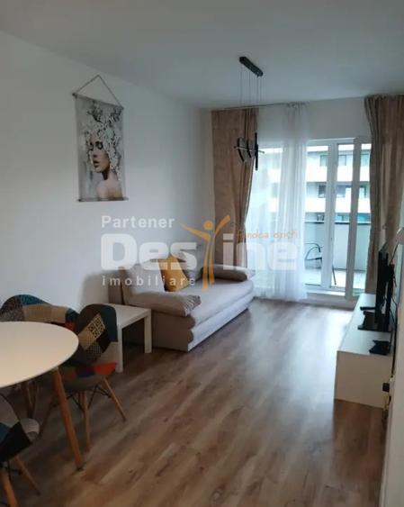 Studio la ertaj intermediar, cu balcon si parcare subterana, situat in Tractorul