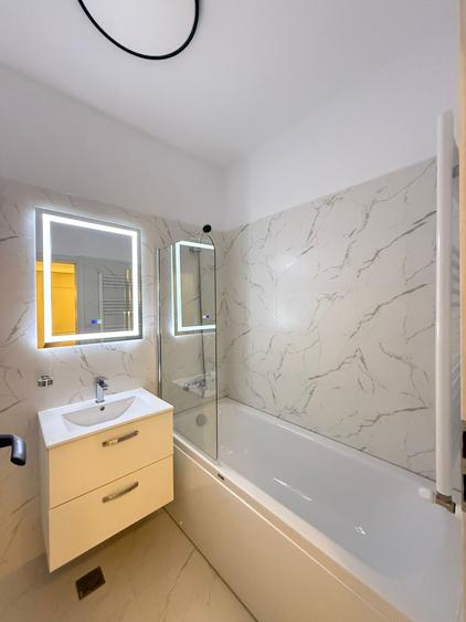 VANZARE APARTAMENT 2 CAMERE COMPARTIMENTARE MODERNA-BALCON LA PARTER