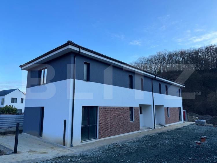 Casa tip duplex, 4 camere, 118 mp utili, 200 mp de teren, zona Tauti
