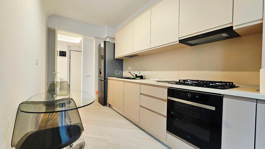 Ofer spre închiriere apartament 2 camere decomandat plus loc parcare subteran  - 7