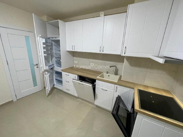 Inchiriez ap. 2 camere, minim 2 ani, renovat, garaj, et.2, lift, balcon 12 mp. - 9