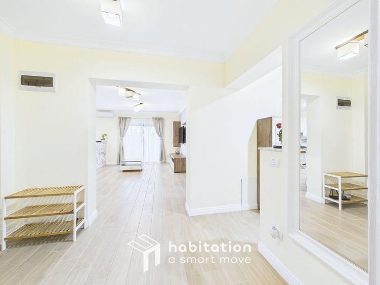Apartament spațios cu curte și garaj – confortul unei case moderne