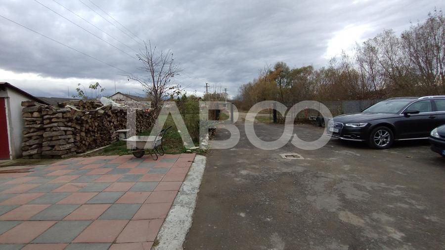 Afacere si locuinta cu teren de 1450 mp de vanzare in Rausor