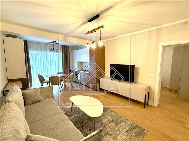 Ap 2 camere - complet mobilat si utilat modern - prima inchiriere