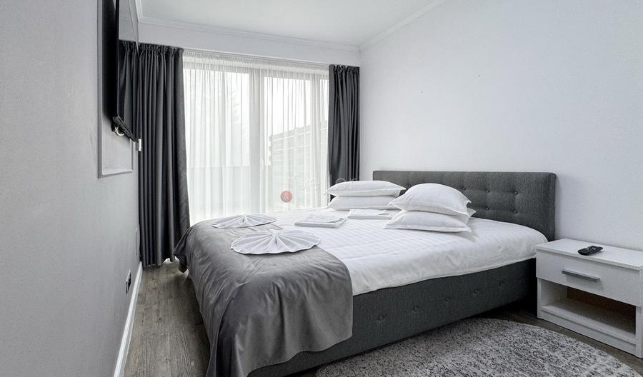 Apartament ce ofera acces catre 2 terase generoase