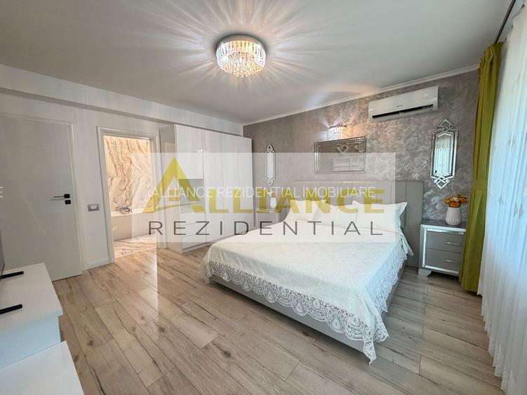 Casa P+1+M cu teren de 650 mp, piscina si curte complet amenajata
