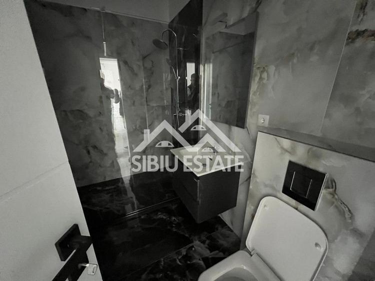 Apartament modern 2 camere in Selimbar cu parcare boxa și balcon