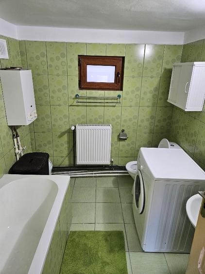 Casa gata de mutat la 50km de Bucuresti, 103 mp utili, curte 1000 mp