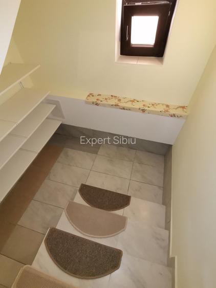 INCHIRIEZ casa 5 camere decomandate ,cu garaj,zona Calea Cisnadiei