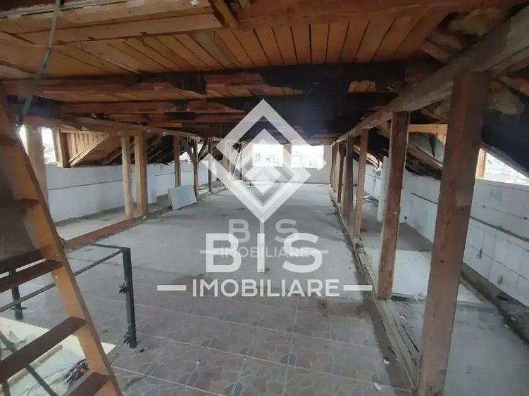 Cladire P+1+M cu destinatie mixta