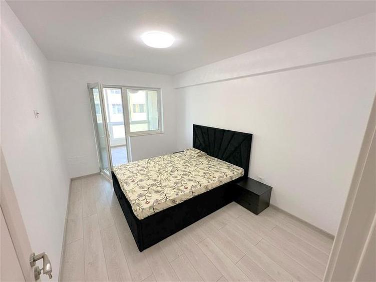 Apartament 2 camere, etaj 2, utilat, semimobilat, cu loc parcare zona Nord