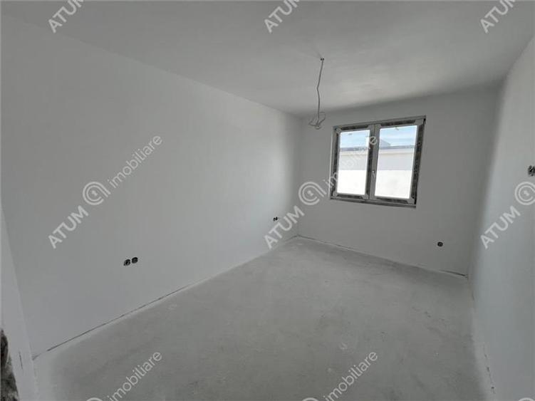 Casa cu 4 camere 2 bai curte de 50 mp zona Calea Cisnadiei Sibiu
