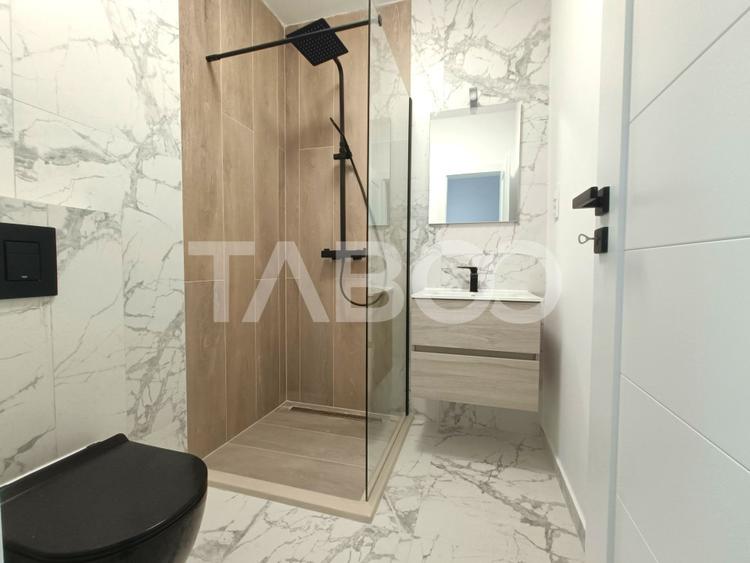 Apartament spatios 3 camere 2 bai - incalzire pardosea - parcare