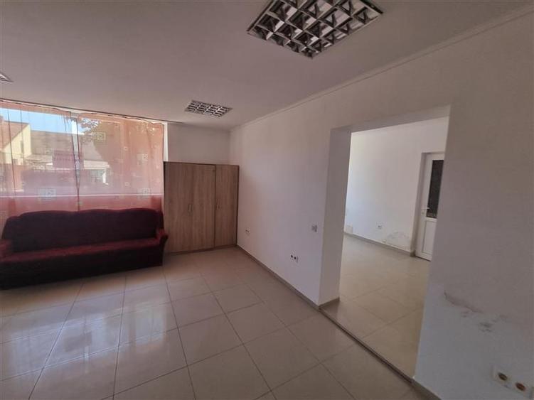 Apartament de 62 mp , parte din casa, cu intrare separata, posibil spatiu comerc