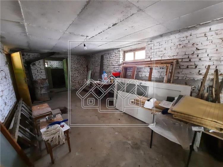 Casa in centrul Cisnadioarei - teren 1177 mp - ideal investitie - 16