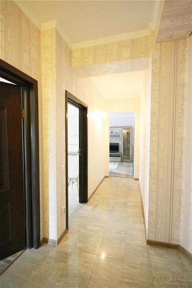 Apartament central cu acces la gradina si 2 locuri parcare