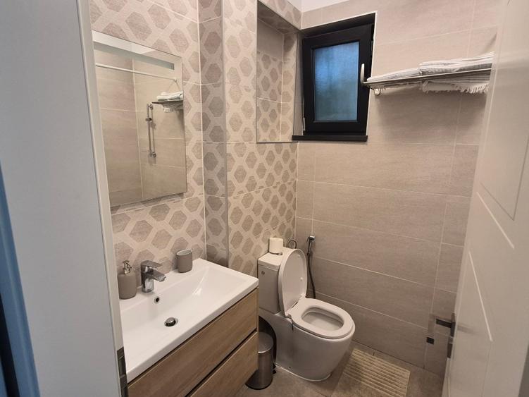 Apartament 2 camere si curte proprie zona 13 Septembrie