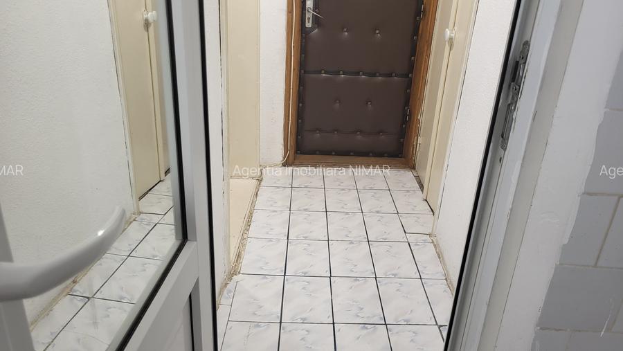 De inchiriat apartament 2 camere, situat etaj 1 in bloc mic, zona Hotel Vrancea. - 14