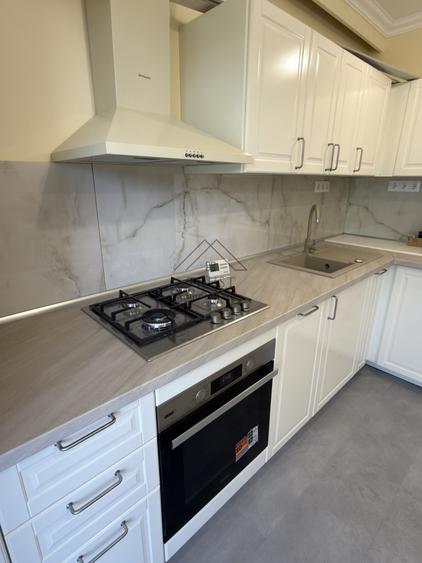 Apartament 2 camere complet renovat și mobilat, la intrare în Borhanci