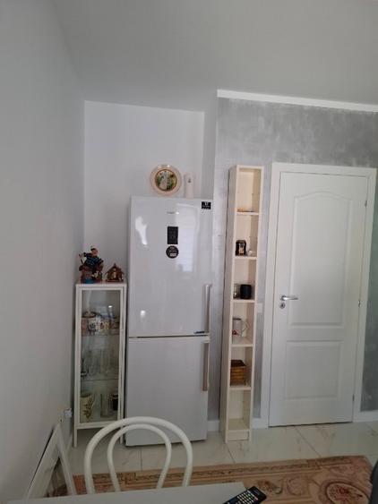 Apartament la curte cu loc de parcare