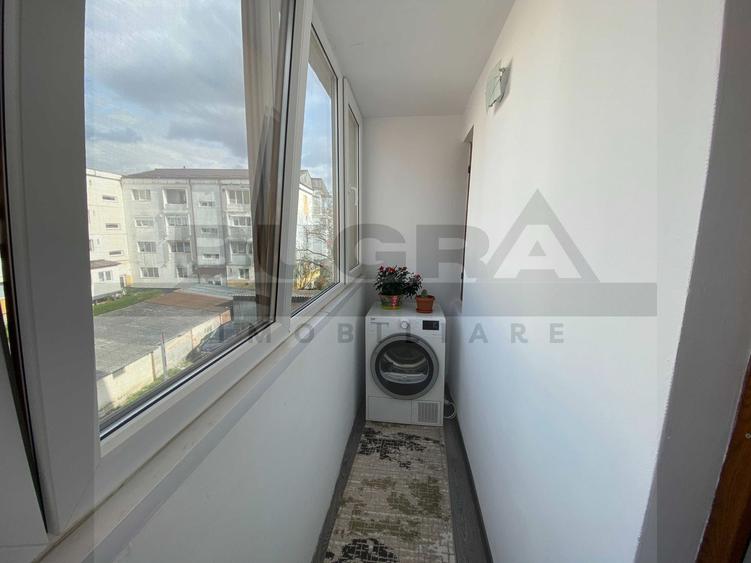 Apartament elegant de 3 camere,65m curte privată, zona Primariei Baciu