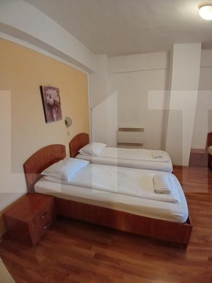 Pensiune 14 camere cu bai proprii si intrari separate, 500 mp, zona Mehala