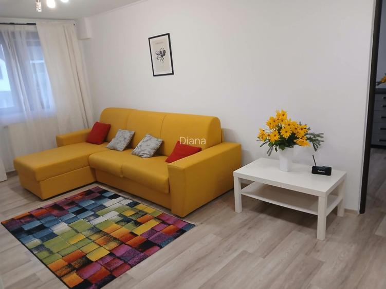 Un apartament cochet, cu parcare proprie, aproape de parcuri si birouri