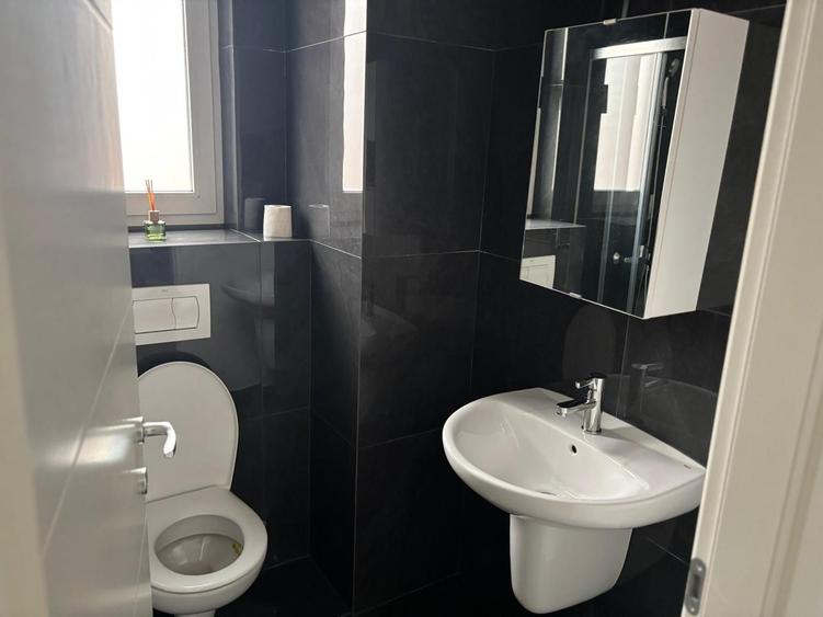 Apartament cu 2 camere de închiriat – modern, cu GRADINA PROPRIE
