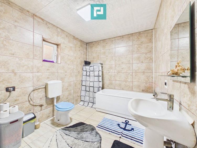 Casă P+E cu două apartamente, zona Drăgășani - 7